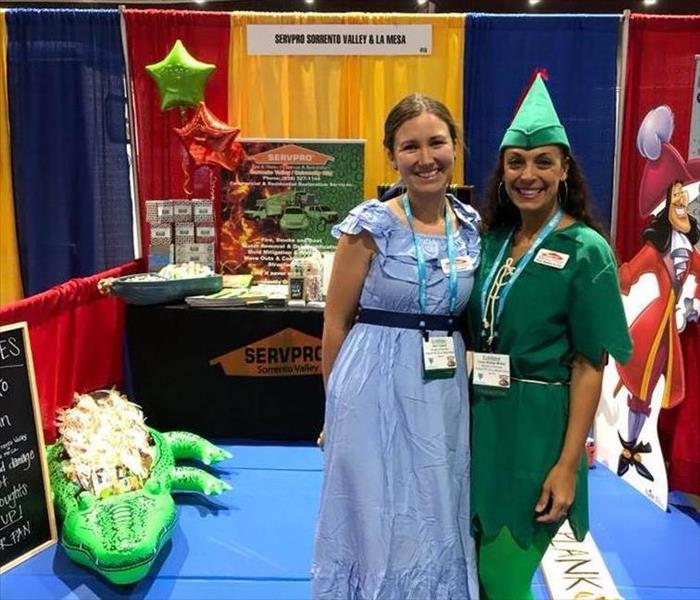 Employee dressed as Peter Pan at our booth at an expo